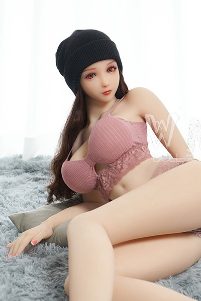 sitting pink bikini doll