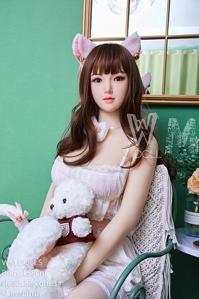 sitting realistic doll