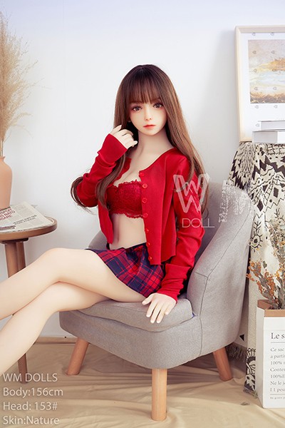 sitting red sweater doll