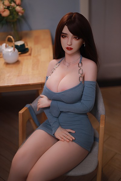 big boobs sitting doll