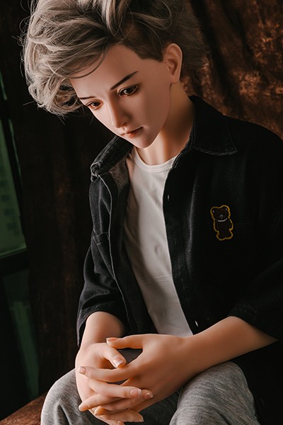 sitting male doll