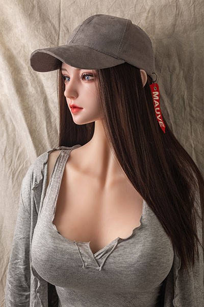 side view doll with hat