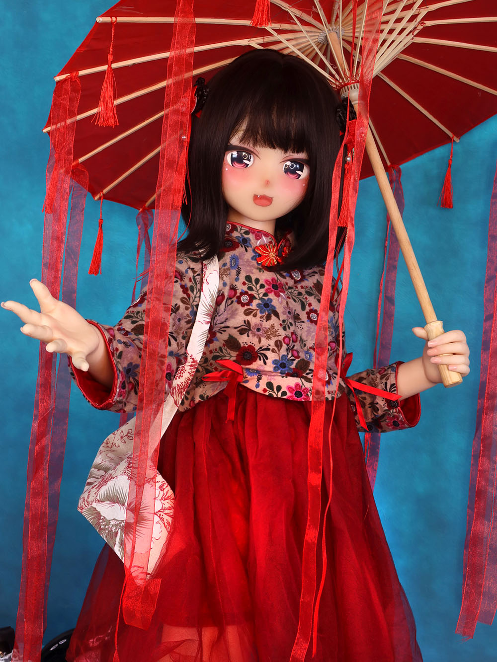 red dressing doll