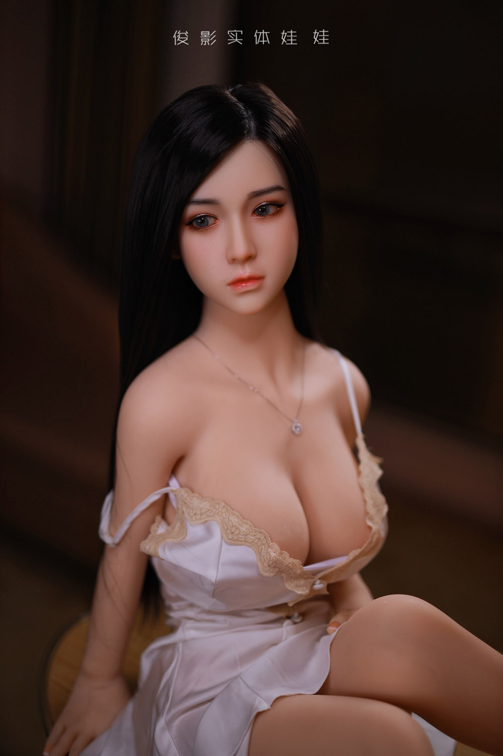 big boobs sitting doll